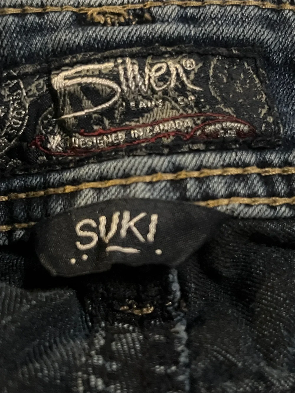 Silver Jeans Dark Blue Bootcut Jeans with Sequin Pocket Detail